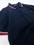 POLO FRED PERRY NEGRO CON TIPPINGS ROJO Y BLANCO TALLA M