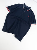 POLO FRED PERRY NEGRO CON TIPPINGS ROJO Y BLANCO TALLA M