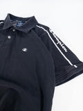 POLO DE MANGA CORTA CHAMPION NEGRO CON BANDAS LOGO - TALLA L (GRANDE)