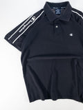 POLO DE MANGA CORTA CHAMPION NEGRO CON BANDAS LOGO - TALLA L (GRANDE)