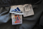 PANTALÓN ADIDAS CHALLENGER GRIS - BANDAS AZULES - TALLA M