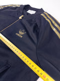 CHAQUETA ADIDAS x SHELL NEGRA Y DORADA TALLA S