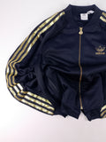 CHAQUETA ADIDAS x SHELL NEGRA Y DORADA TALLA S