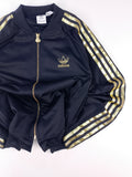 CHAQUETA ADIDAS x SHELL NEGRA Y DORADA TALLA S